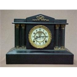 Ansonia iron cased mantle clock, brass bow cr