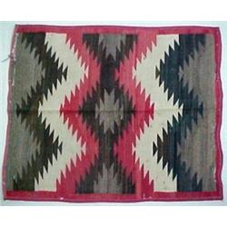 Navajo rug, in red, brown, black and cream, C