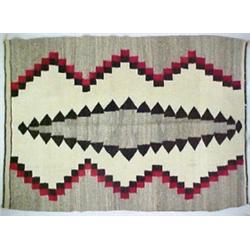 Navajo rug, in grey, brown, and beige, C. 192
