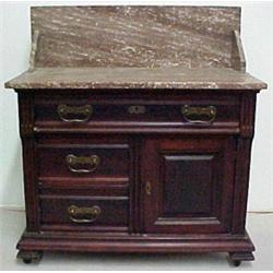 Walnut Victorian washstand, brown beveled mar