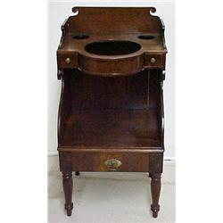 Mahogany Sheraton washstand, scrolling splash