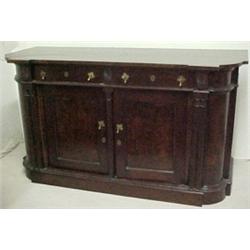 A walnut sideboard, formed top over two short