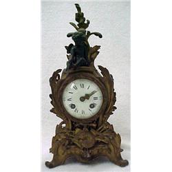 French brass clock, foliate finial with metal