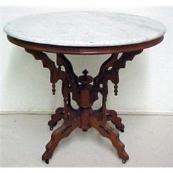 Walnut Victorian marble top center table, ova
