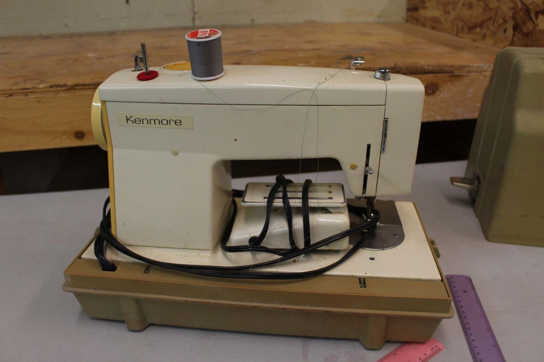 Vintage Sears Kenmore Sewing Machine in Cabinet | EstateSales.org Vintage sears kenmore sewing machine