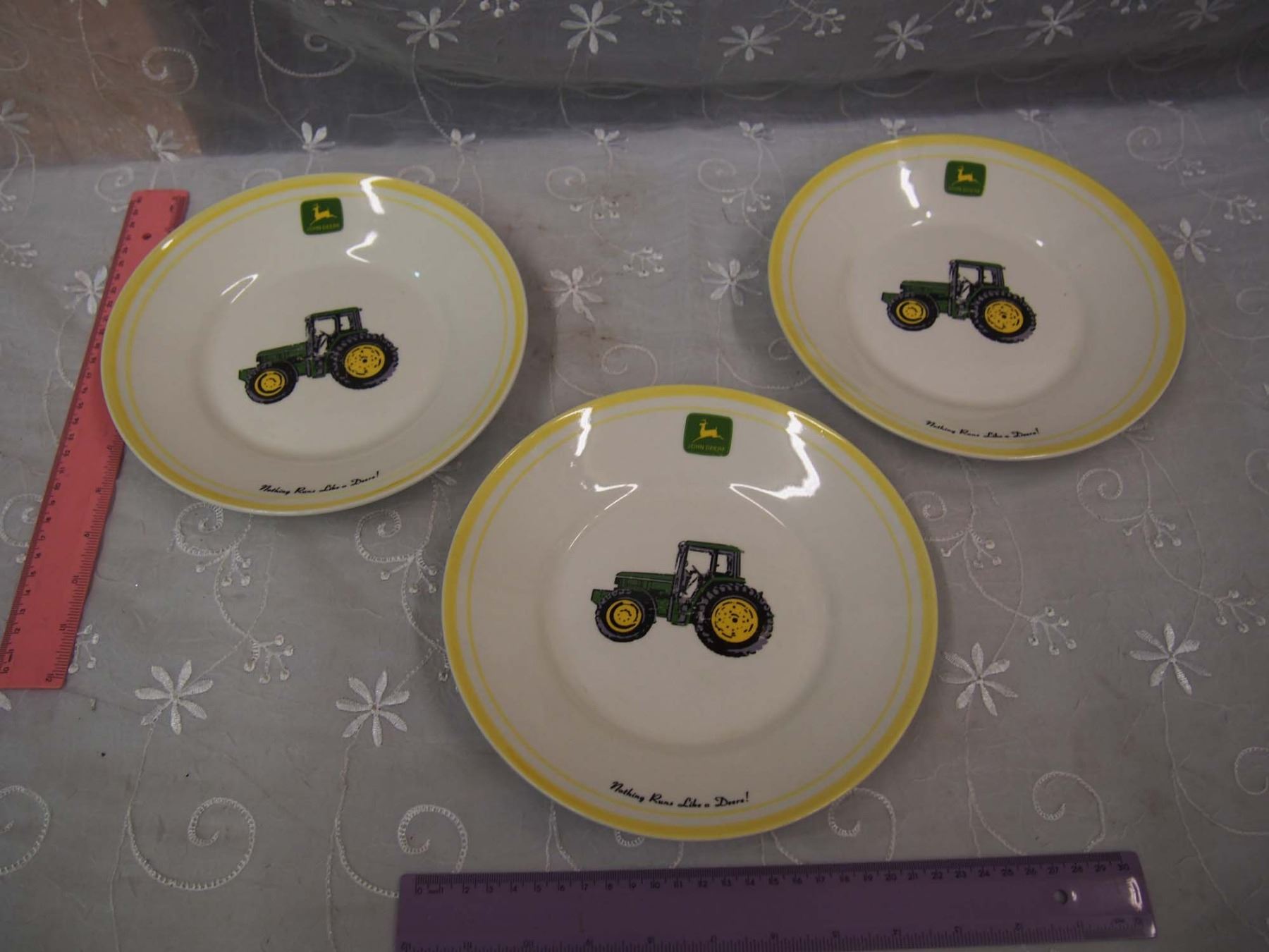 Lot of John Deere Plates