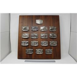 Wooden Display of Massey Harris Belt Buckles (16)