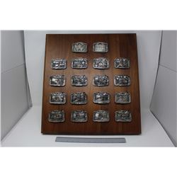 Wooden Display of Massey Harris Belt Buckles (18)