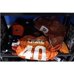 SHELF OF BC LIONS PLAYER TIM CRONK MEMORABILIA - HP LAPTOP, JERSEY, FRAMED PHOTOS, AND MORE