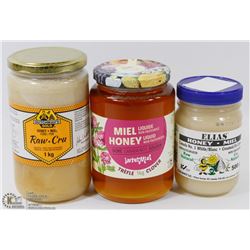 FLAT W/ ASSORTED JARS OF HONEY.