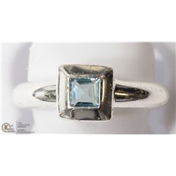 18) STERLING SILVER BLUE TOPAZ RING