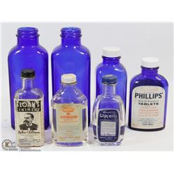 LOT OF 7 BLUE & CLEAR DRUG STORE BOTTLES.