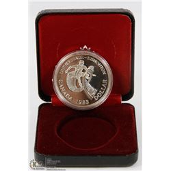 1983 CANADIAN PROOF SILVER DOLLAR IN DISPLAY