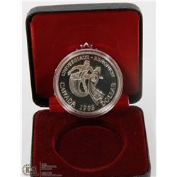 1983 CANADIAN PROOF SILVER DOLLAR IN DISPLAY