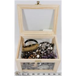 SEE THROUGH BOX FULL OF COSTUME JEWELRY