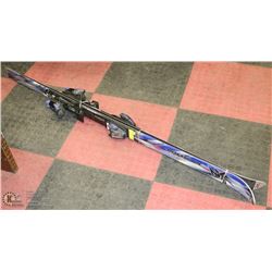 ROSSIGNOL SKIS WITH SALOMON BINDINGS.