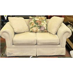 BEIGE LOVESEAT WITH THROW CUSHIONS