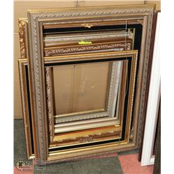 STACK OF ORNATE PICTURE FRAMES