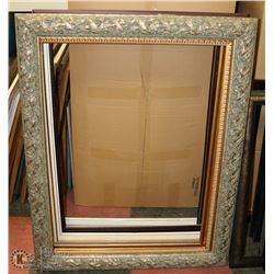 STACK OF EXTRA  LARGE PICTURE FRAMES