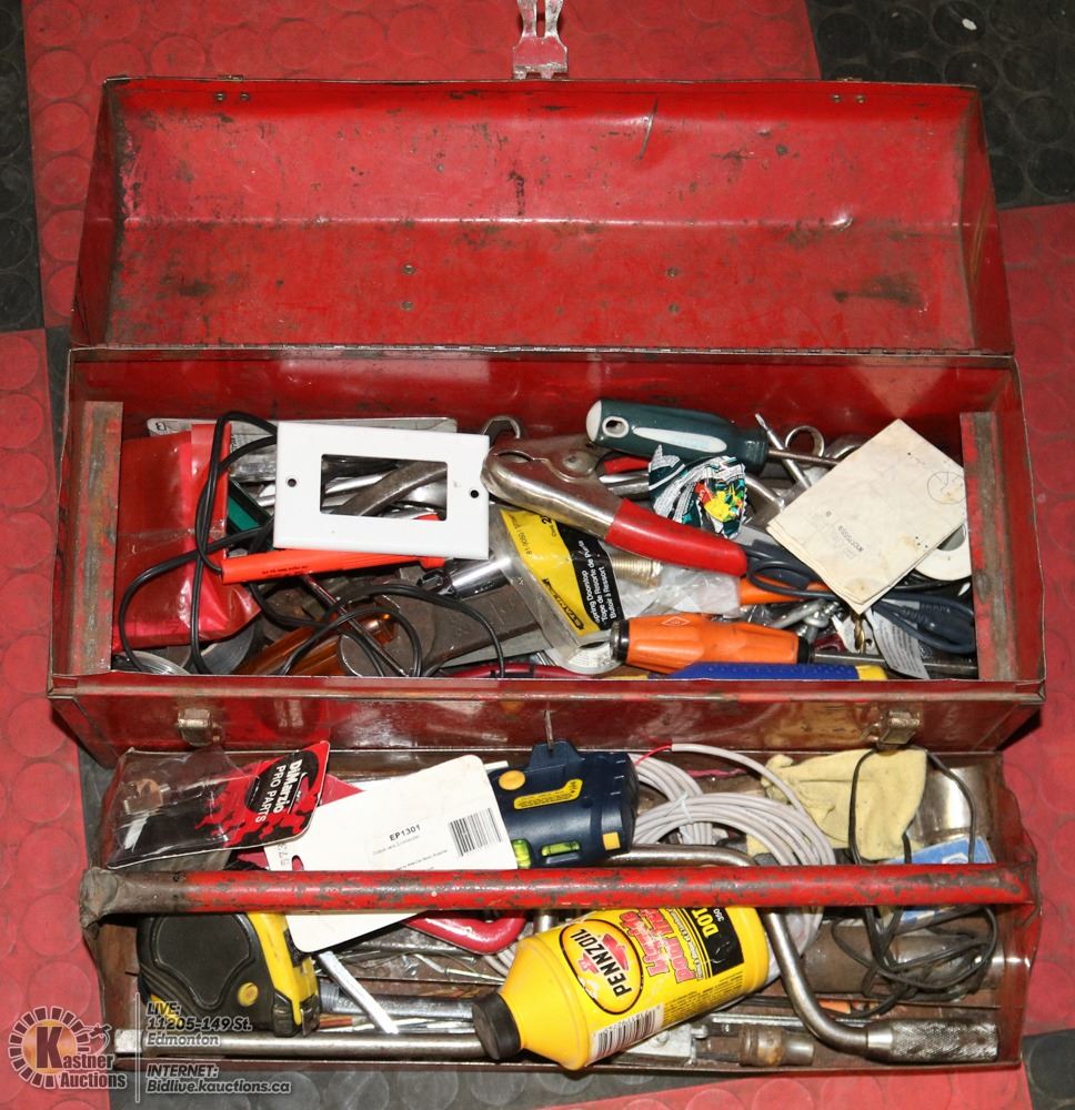 RED TOOL BOX FILLED WITH ASSORTED TOOLS.