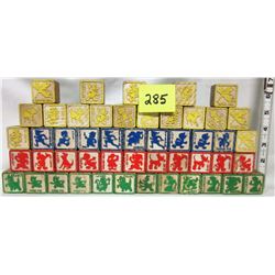 assorted vintage wooden Disney character alphanet blocks
