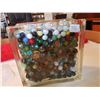 Image 1 : huge glass container of marbles