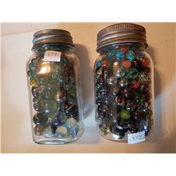 2 jars of marbles lots of large size