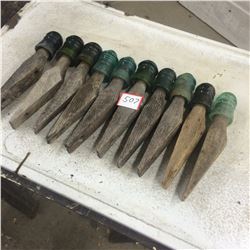 10 Insulators on wooden pegs