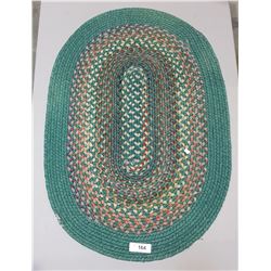 GREEN BRAIDED WOOL RUG