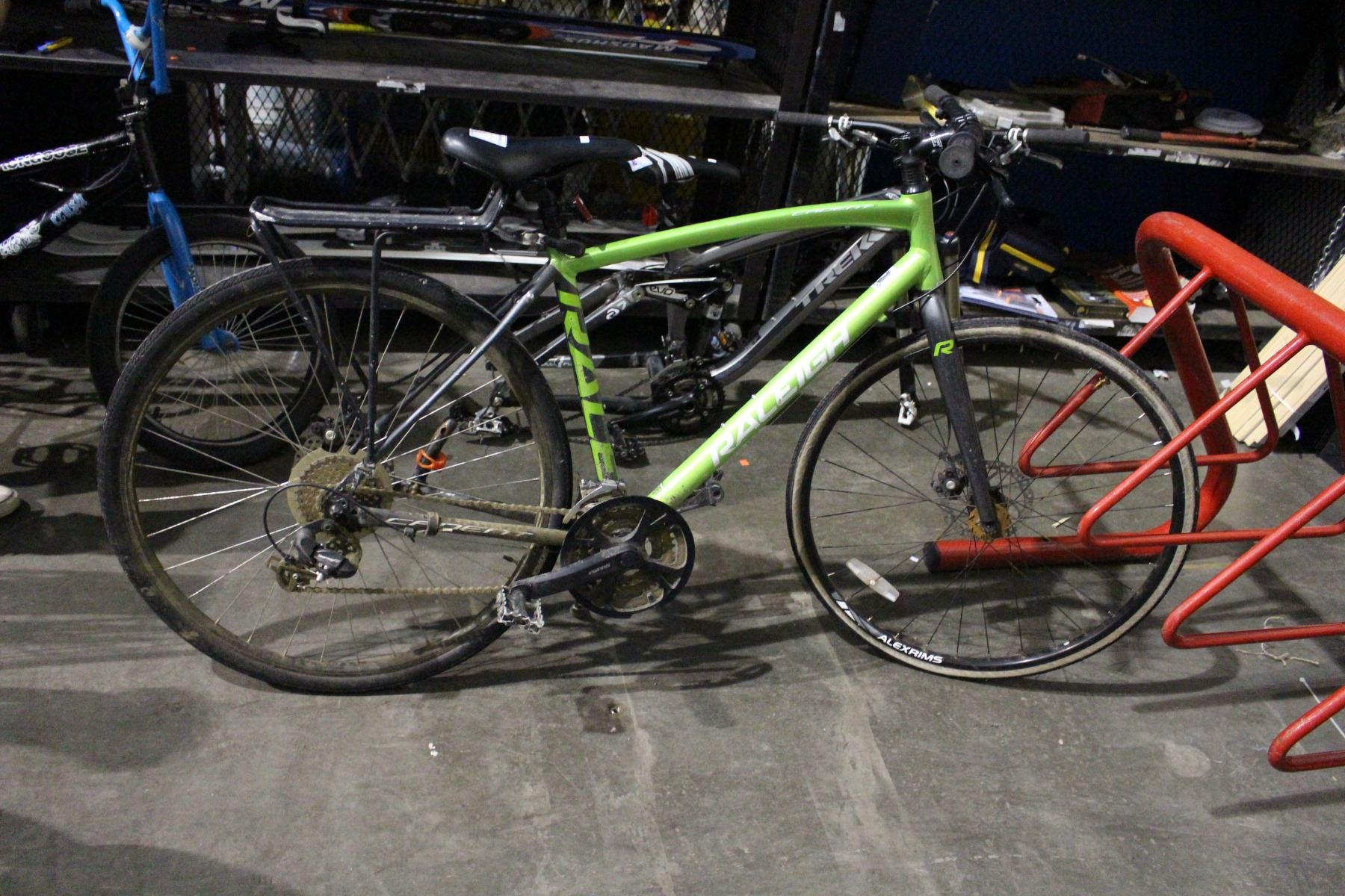 Green Raleigh Bike GREEN RALEIGH 24SPD BIKE WITH DISC BRAKES - Able Auctions