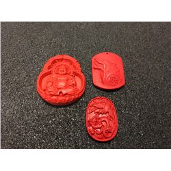 3 X CARVED CINNABAR GEMSTONE PENDANTS, BUDDHA, DRAGON/PHOENIX & WOLF