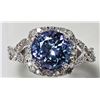 Image 1 : 14K WHITE GOLD TANZANITE (3.20CT) AND 46 DIAMOND (0.46CT) HALO TWIST RING. INSURANCE VALUE $6500