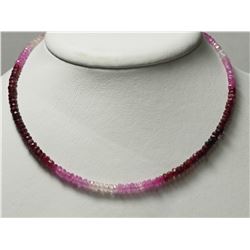 14K YELLOW GOLD RUBY AND SAPPHIRE (45.0CT) GRADUATED COLOUR BEAD 16" NECKLACE. RETAIL APPRAISED