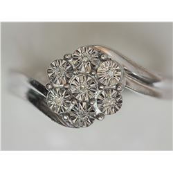 11) STERLING SILVER RING WITH 7 DIAMONDS