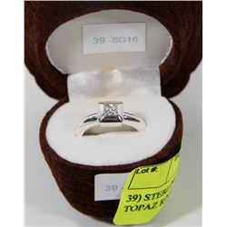 39) STERLING SILVER GENUINE BLUE TOPAZ RING