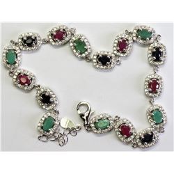 44) STERLING SILVER GEMSTONE CZ BRACELET