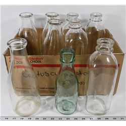 BOX OF VINTAGE MILK BOTTLES.