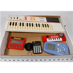 FLAT WITH ELECTRONIC GAMES INCLUDING CASIO PT-82