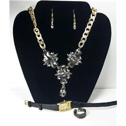18 - GOLD TONE & GREY CRYSTAL