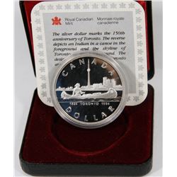 1984 CANADIAN PROOF SILVER DOLLAR IN DISPLAY WITH