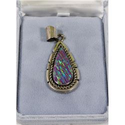STERLING SILVER PENDANT WITH AMMOLITE.
