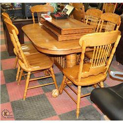 SOLID OAK DININGROOM TABLE WITH CARVED CLAW FEET