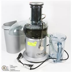 BREVILLE JUICER WITH ATTACHMENT & STORAGE PITCHER.