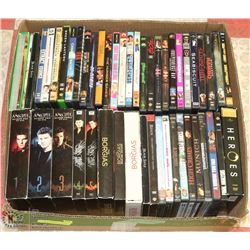 FLAT OF 83 ASSORTED DVDS.