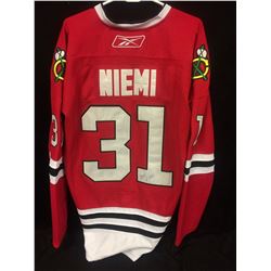 ANTII NIEMI AUTOGRAPHED BLACK HAWKS JERSEY