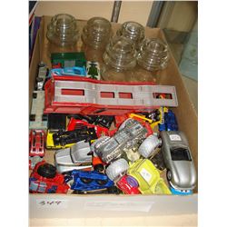 TRAY OF TOY CARS AND GLASS INSULATORS