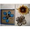 Image 1 : THREE VINTAGE METAL AND ENAMEL FLORAL BROOCHES