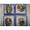 Image 1 : FOUR STAINLESS STEEL BIKER RINGS