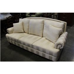 WHITE STUDDED ROLLED ARM PILLOWBACK SOFA