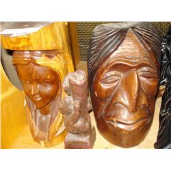 WOOD MASKS AND CARVED WOOD STUMP